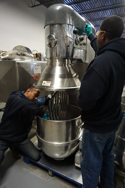 Employees working on machinery