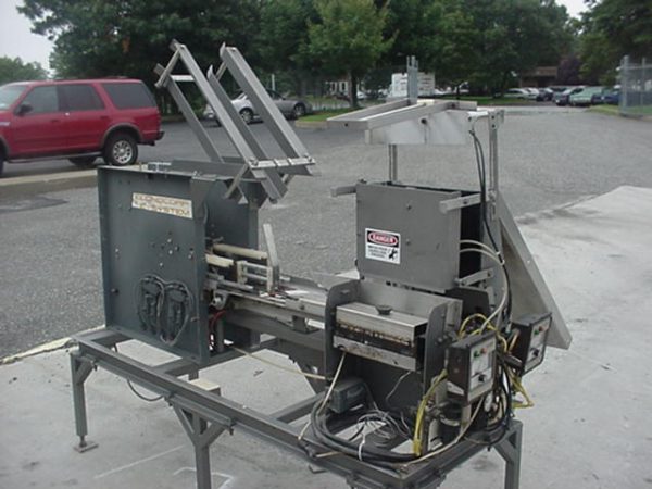 ECONOCORP "E" AUTOMATIC CARTONER, SLEEVE STYLE CARTON