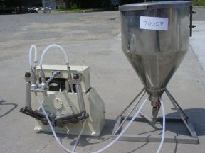 TWO SPOUT TABLETOP PISTON FILLER WITH HOPPER