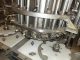 PFAUDLER 21 PISTON ROTARY FILLER, WITH CONVEYOR