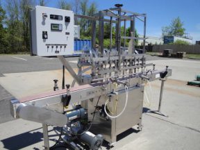PACKAGING DYNAMICS TWELVE SPOUT STAINLESS AUTOMATIC LIQUID FILLER