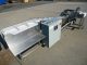 AIR-DRAULIC INCLINED CLEATED BELT CONVEYOR WITH AUTOMATIC DUMP, STAINLESS STEEL