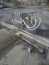 NATIONAL INSTRUMENT "FILAMATIC"" FOUR PISTON FILLER WITH CONVEYOR, 32 oz. pistons