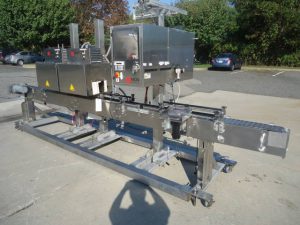 AXON EZ-130 SLEEVING SYSTEM WITH TWIN SHRINK TUNNELS, 15 FT. CONVEYOR