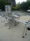 FILLING EQUIPMENT COMPANY TWELVE SPOUT STRAIGHT LINE AUTOMATIC LIQUID FILLER