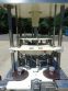 MRM/ELGIN TWELVE SPOUT ROTARY VACUUM FILLER, EXPLOSION PROOF