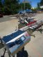 INLINE FILLING SYSTEMS SIX HEAD LEVEL HEAD OVERFLOW PRESSURE FILLER WITH 20 FT. CONVEYOR