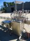 INLINE FILLING SYSTEMS SIX HEAD LEVEL HEAD OVERFLOW PRESSURE FILLER WITH 20 FT. CONVEYOR