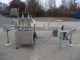 JG MACHINE WORKS TWELVE SPOUT AUTOMATIC PRESSURE GRAVITY FILLER