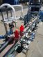 OCEAN PACKING TWO HEAD PUMP STYLE STAINLESS STEEL FILLING AND CAPPING MACHINE