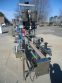 OCEAN PACKING TWO HEAD PUMP STYLE STAINLESS STEEL FILLING AND CAPPING MACHINE