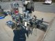 OCEAN PACKING TWO HEAD PUMP STYLE STAINLESS STEEL FILLING AND CAPPING MACHINE