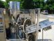 UNIPAC/ROMACO SILVER 80E PLASTIC TUBE FILLING AND SEALING MACHINE, 80 PER MINUTE