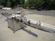 MRM Versafil Twelve Spout Rotary Positive Displacement Filler With Conveyor