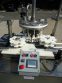 MRM Versafil Twelve Spout Rotary Positive Displacement Filler With Conveyor