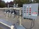 PVC 4 SPOUT STRAIGHT LINE AUTOMATIC PRESSURE GRAVITY LIQUID FILLING MACHINE