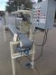 PVC 4 SPOUT STRAIGHT LINE AUTOMATIC PRESSURE GRAVITY LIQUID FILLING MACHINE