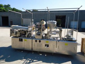 MODERN PACKAGING THREE LANE CUP FILLER/SEALER/LIDDER , STAINLESS STEEL