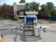 Pack West eight spindle inline automatic capper