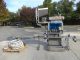 Pack West eight spindle inline automatic capper