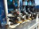 Pack West eight spindle inline automatic capper