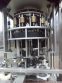 New England Machinery Ten Head Rotary Capper With  Feeder/Unscrambler