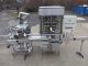 New England Machinery Ten Head Rotary Capper With  Feeder/Unscrambler