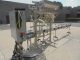 Fluid Packaging Solutions 10 Spout SS Gravity Liquid Filler, "Bottom Up" Fill