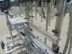 Fluid Packaging Solutions 10 Spout SS Gravity Liquid Filler, "Bottom Up" Fill