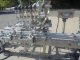 Inline Filling Systems "Servo" Six Nozzle Auto Positive Displacement Pump Style Filling Line, 15 ft. conveyor