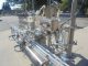 Inline Filling Systems "Servo" Six Nozzle Auto Positive Displacement Pump Style Filling Line, 15 ft. conveyor