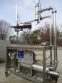 CLEVELAND METERING FILLING STATION WITH TIPPER TIE CLOSURE