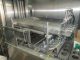 BWI Holmatic Opti-Fil four lane cup filling line