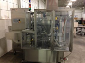 Packaging Technologies RO-A7 Powder Cup Filling/Sealing System,  Auger Filling
