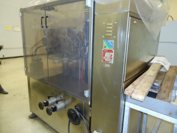 Unipac "Silver 100" Automatic Plastic Tube Filler/Sealer, 80 Per Minute