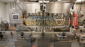 Acasi 12 Fully Automatic Piston Inline Filler, w/conveyor, "Hot Product" Fill