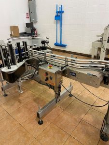 Quadrel "Moduline" Automatic Pressure Sensitive Wraparound Labeler