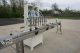 RJM 8 Spout Straight Line Liquid Filling Machine, Pressure Gravity Nozzles
