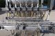 REB 6 Head Automatic Inline Piston Filling Machine, Agitated Hopper