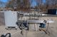 MRM/Elgin 8-Head Straightline Overflow Filling Machine