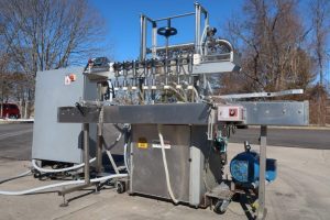 MRM/Elgin 8-Head Straightline Overflow Filling Machine