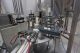 Modern Packaging MR Series Rotary Cup Filling and Sealing Machine