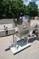 Universal Four (4) Spindle Cap Tightener/Retorquer, With Conveyor