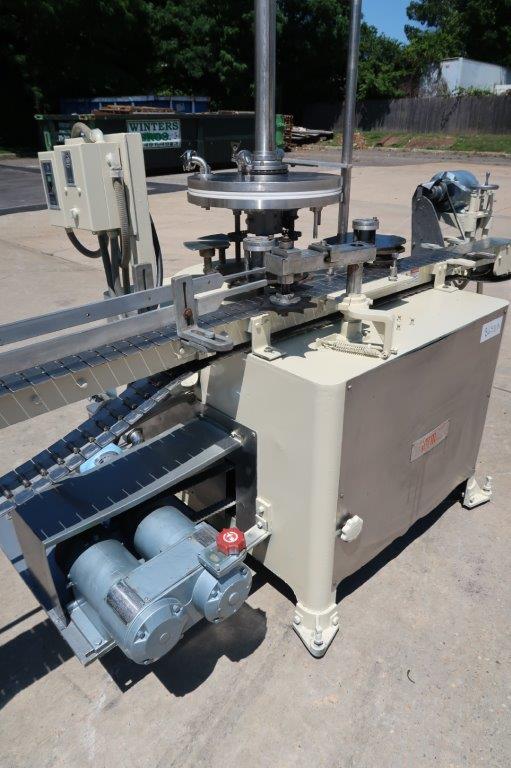 MRM Versa Fil Six Head Rotary Time and Pressure Positive Displacement Filling Machine with Waukesha Pump Wohl Associates