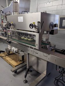 Pharmapack Six Spindle Auto Screw Capper, with Waterfall Cap Elevator