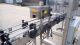 Aesus “Delta” High-Speed Neck Bander with Shrink Tunnel