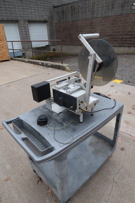 Universal R310 SemiAutomatic Spot/Wrap Labeler Wohl Associates
