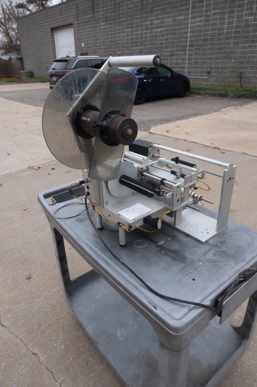 Universal R310 SemiAutomatic Spot/Wrap Labeler Wohl Associates