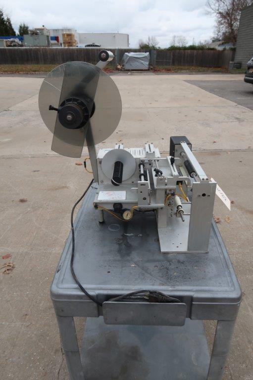 Universal R310 SemiAutomatic Spot/Wrap Labeler Wohl Associates