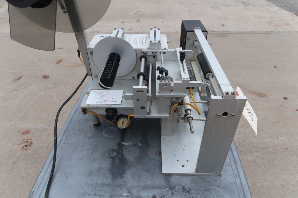 Universal R310 SemiAutomatic Spot/Wrap Labeler Wohl Associates